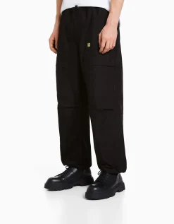 HOMME BERSHKA Collaborations®*Pantalon parachute TOKYO REVENGERS
