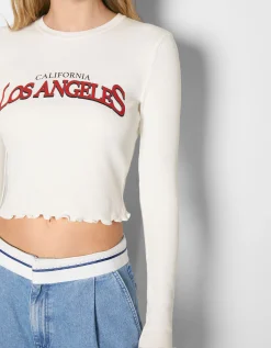 FEMME BERSHKA Tee-shirts*Top cropped manches longues imprimé