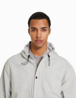 HOMME BERSHKA Blousons et manteaux*Veste en jean parachute capuche